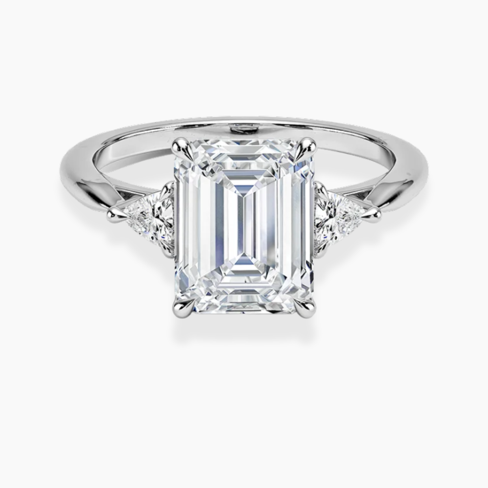 Trilogy (Trilliant Side Stones) Lab Diamond Engagement Ring in 18K Gold - Radiant Emerald