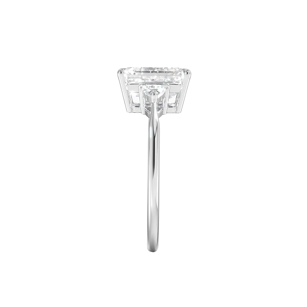 Trilogy (Trilliant Side Stones) Lab Diamond Engagement Ring in 18K Gold - Radiant Emerald