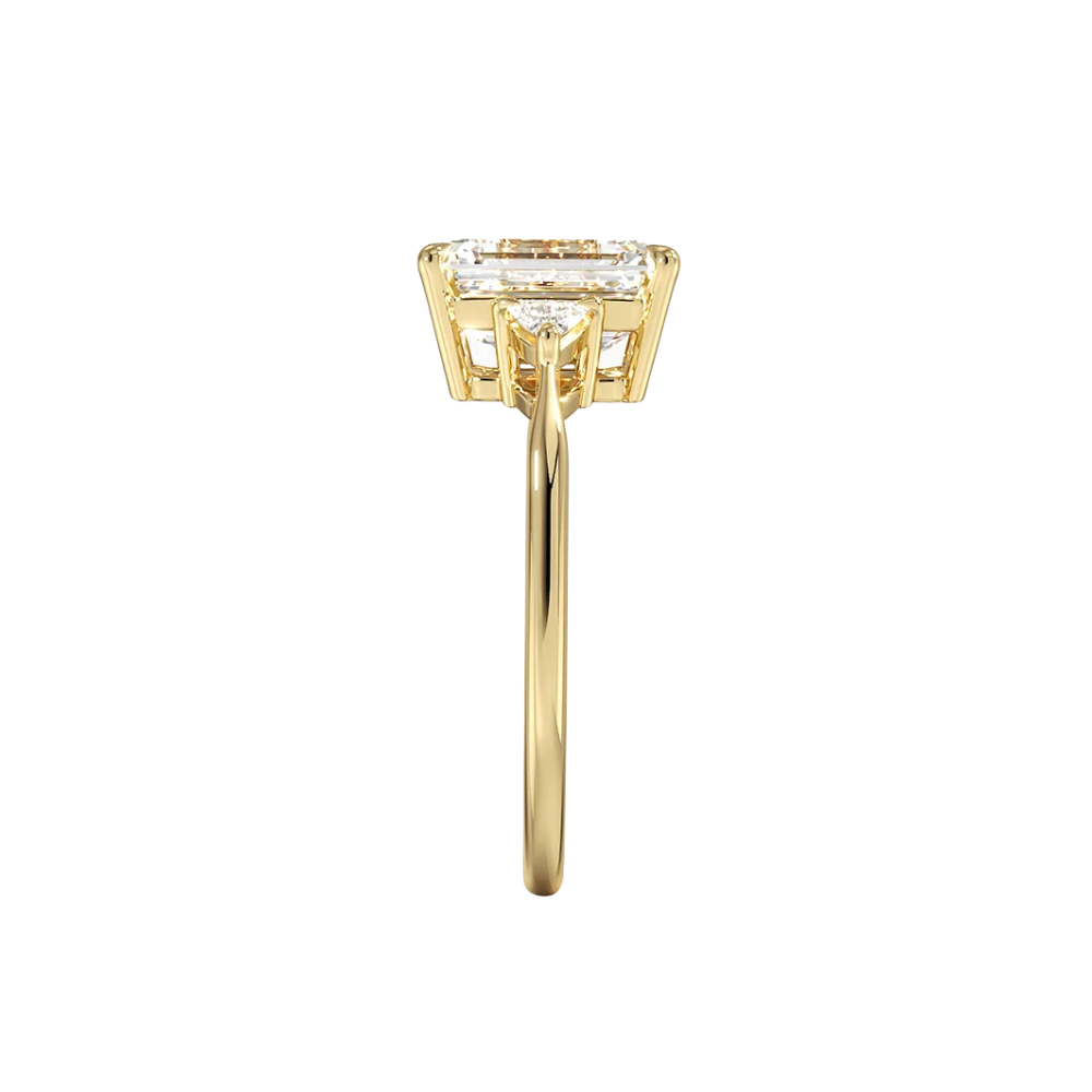 Trilogy (Trilliant Side Stones) Lab Diamond Engagement Ring in 18K Gold - Radiant Emerald