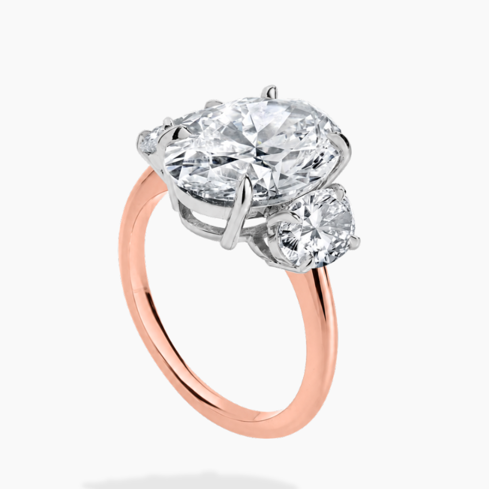 Trilogy Two Tone (Oval Side Diamonds) Oval Lab Diamond Engagement Ring in 18K Gold