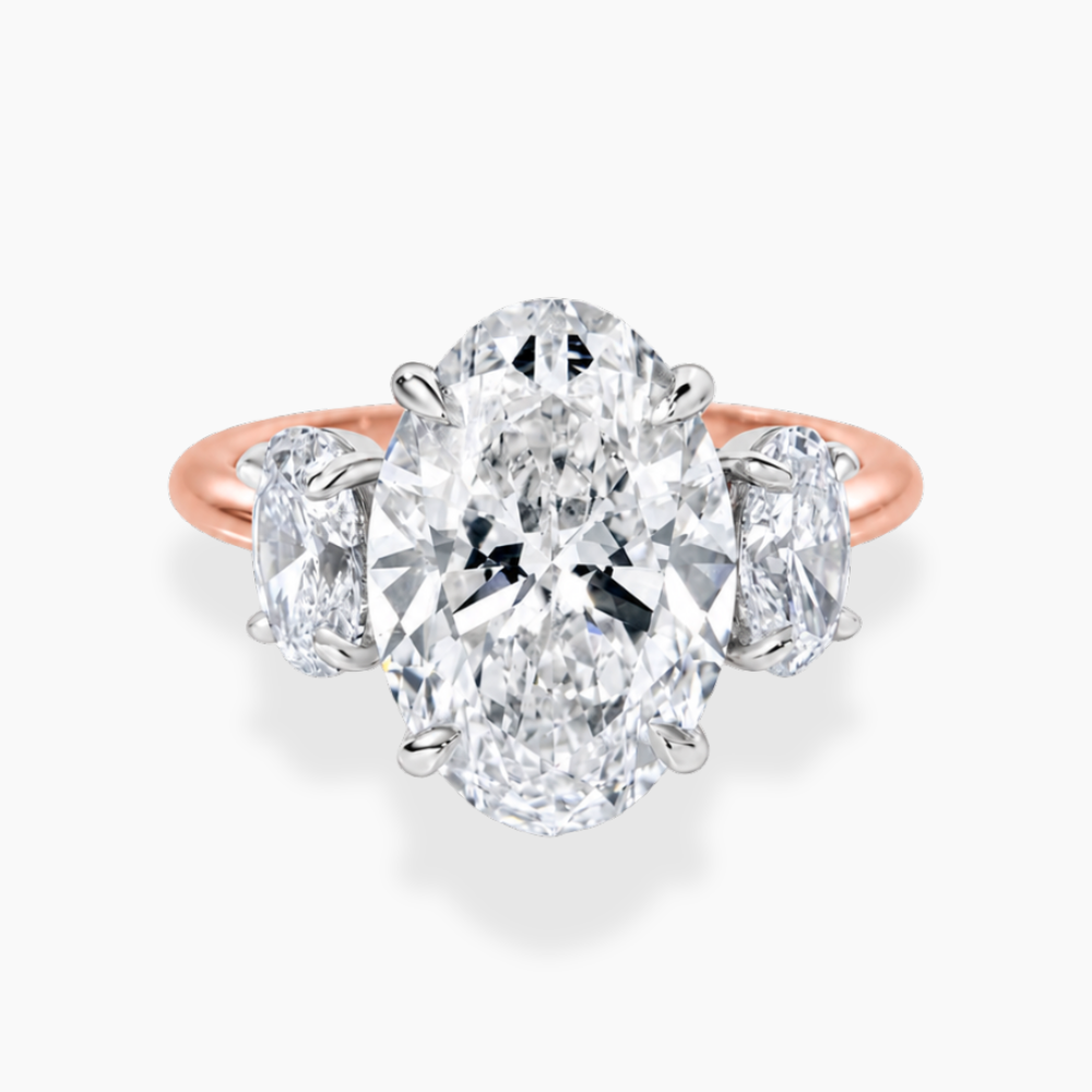 Trilogy Two Tone (Oval Side Diamonds) Oval Lab Diamond Engagement Ring in 18K Gold
