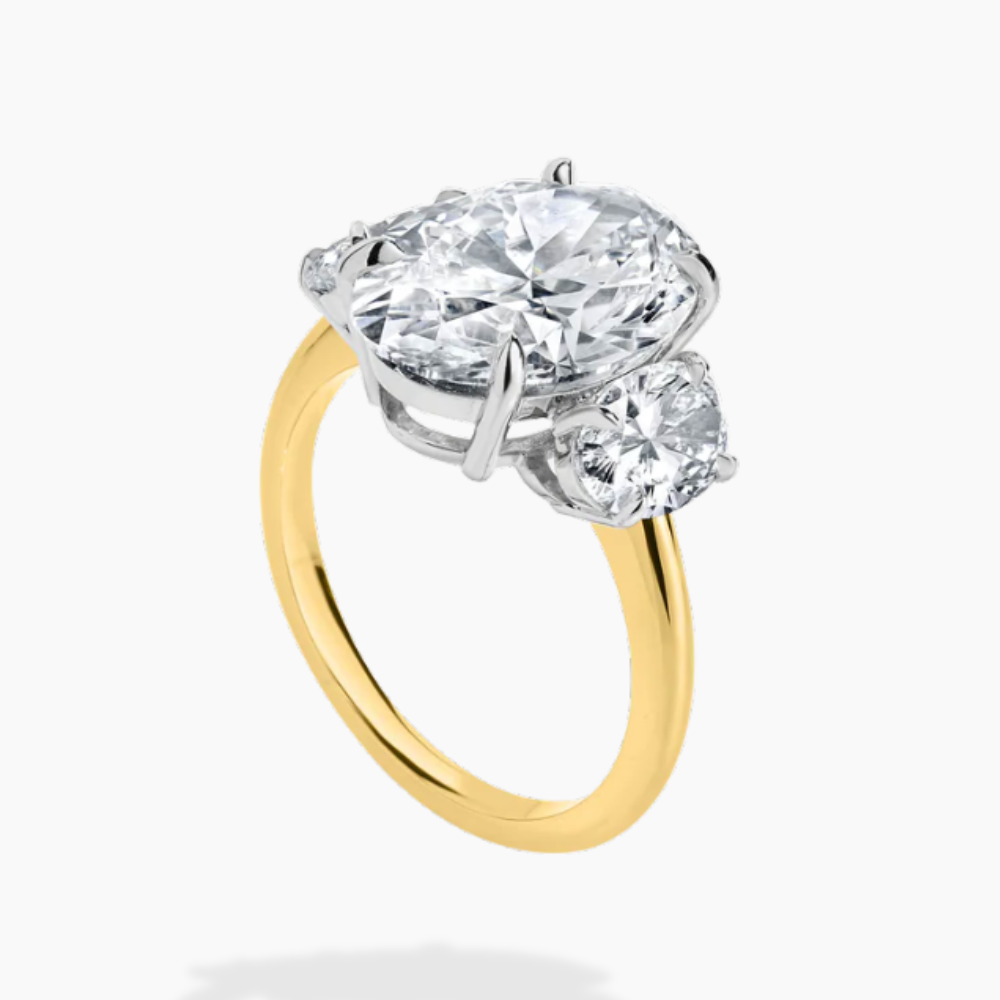 Trilogy Two Tone (Oval Side Diamonds) Oval Lab Diamond Engagement Ring in 18K Gold